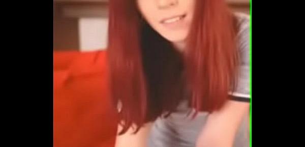  Redhead babe shows pussy